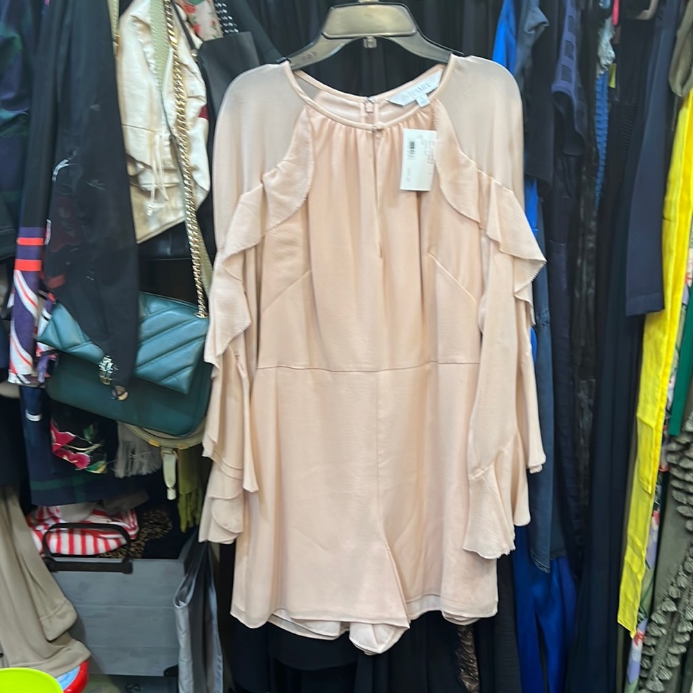 Romper, pink.  Never worn size 4